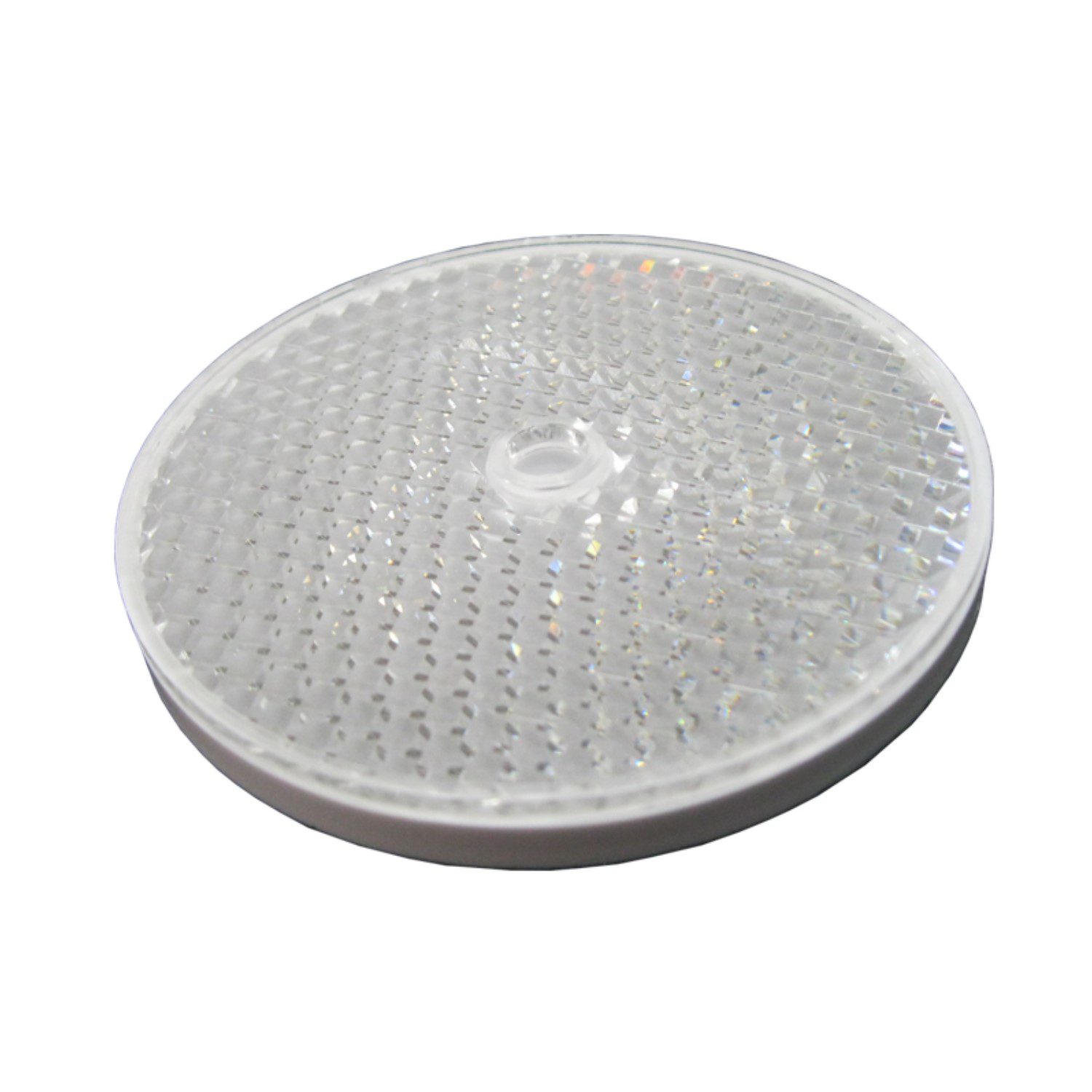 Round reflective safety marker, close-up, on white background in Prestons, New South Wales, Australia.