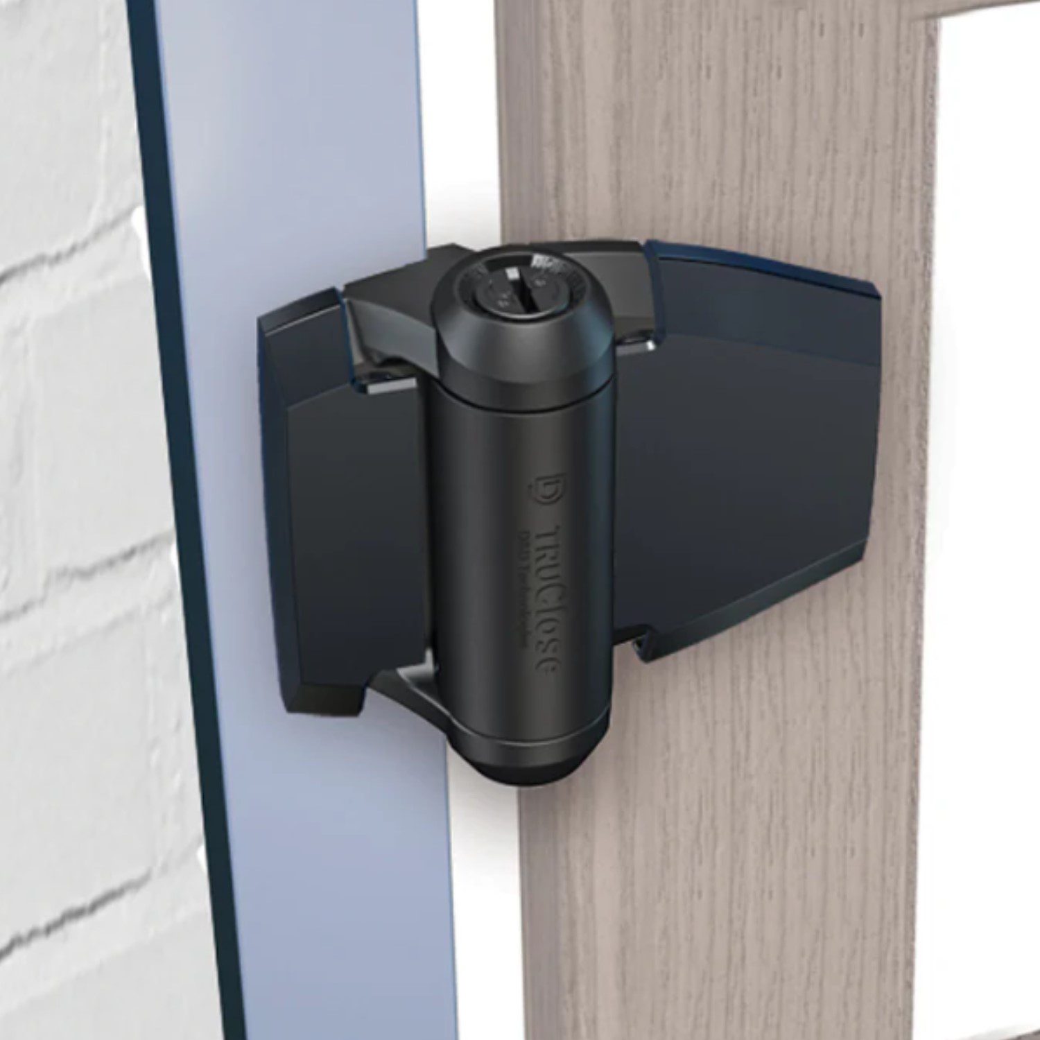 Black TruClose self-closing gate hinge installed on a light wood gate and metal post in Prestons, New South Wales, Australia