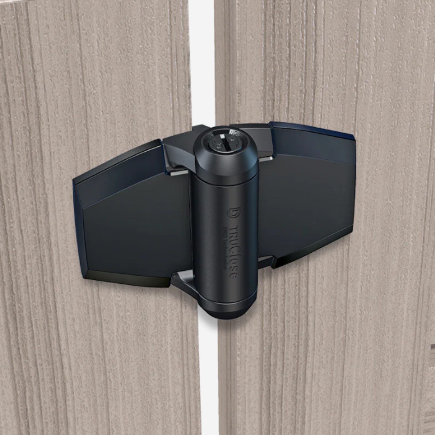 TruClose self-closing hinge mounted between two wooden gate panels, used in Prestons, New South Wales, Australia