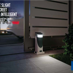 Nighttime view of automatic sliding gate motor installation with LED light, SAMT Garage & Gate Automation, Prestons, New South Wales, Australia.