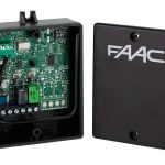 FAAC wireless receiver control box with exposed circuit board and cover, used for gate automation in Prestons, New South Wales, Australia